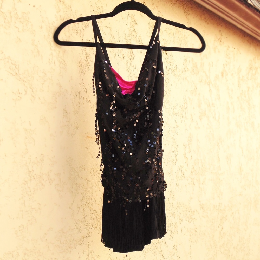 black and pink kids costume with frilly sparkles